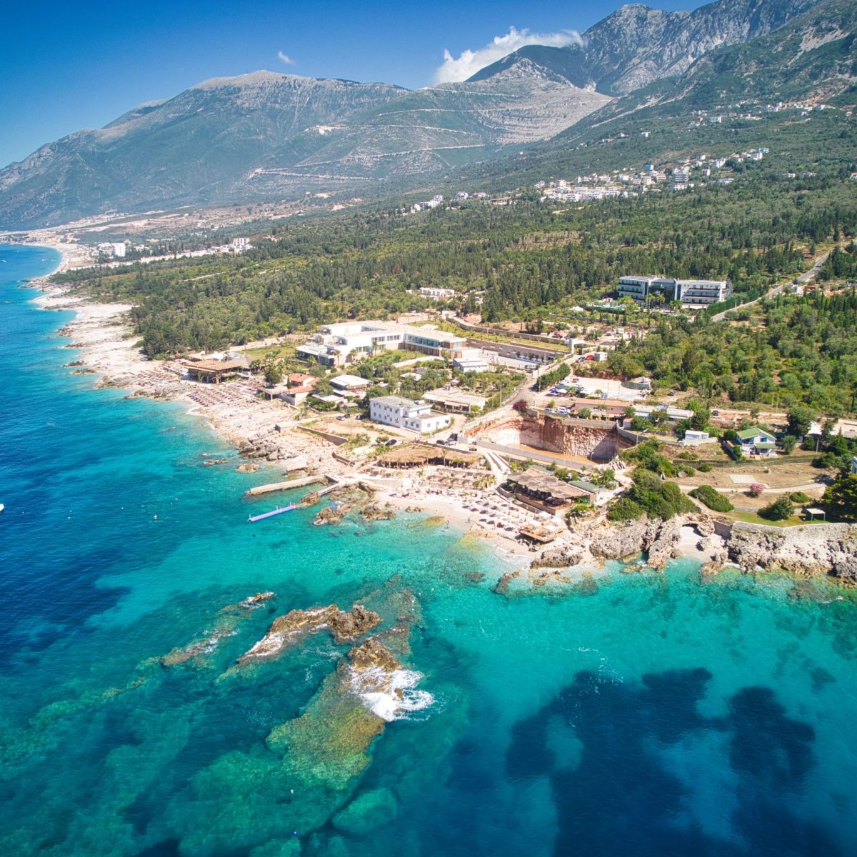 Drone-Shot-of-Dhermi-Beach-min-scaled